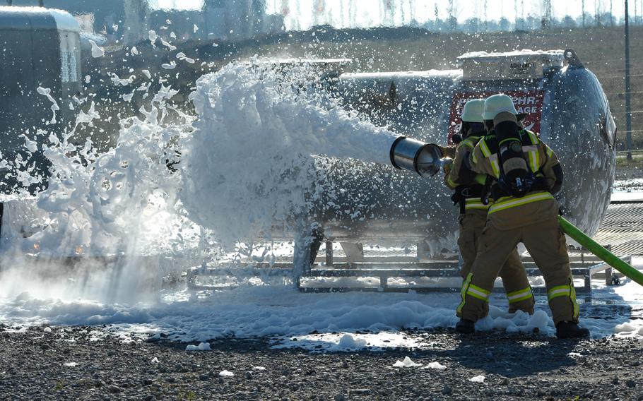 Civilian firefighters from U.S. Army Europe take part in annual training at the Urlas Firefighting Training Center in Ansbach, Germany in 2015. Toxic chemicals called PFAS are a major source of contamination at military bases where firefighting training occurs, the Environmental Protection Agency says on its website.