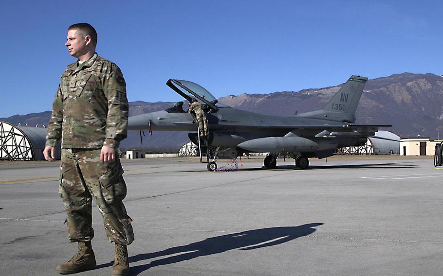 Senior Airman Eric Frank, of the 31st Maintenance Squadron, stands in front of an F-16 Viper at Aviano Air Base, Italy, Feb. 21, 2020. The squadron fabricated steel pins allowing personnel to cut maintenance procedures from 72 hours to just six hours.