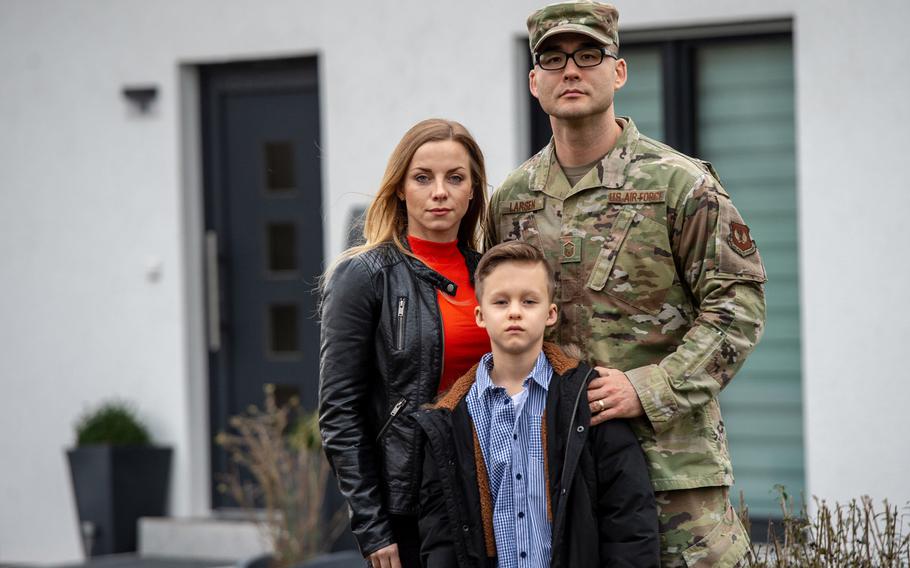 Master Sgt. Matthew Larsen, wife Kathrin and son Jayden stand in front of their house in Reichweiler, Germany, March 11, 2020. German tax authorities are demanding that Larsen, an active duty airman, pay German income tax. U.S. Army Europe says it will step up efforts to warn troops and civilians of the risks they face when it comes to getting taxed by German authorities.
