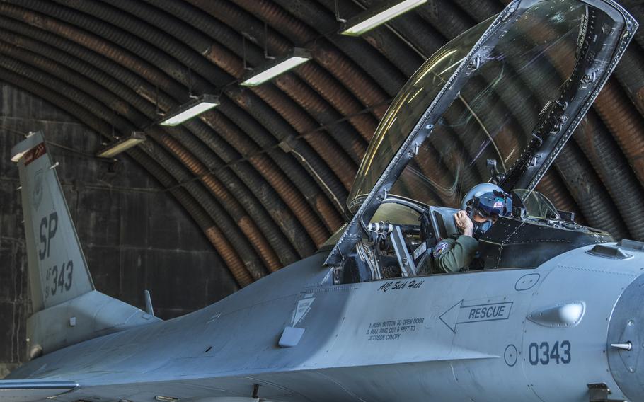 U.S. Air Force Col. Jason Hokaj, 52nd Fighter Wing vice commander, prepares to fly in aircraft No. 343, a F-16 Fighting Falcon, at Spangdahlem Air Base, Germany, on Thursday, April 23, 2020. 