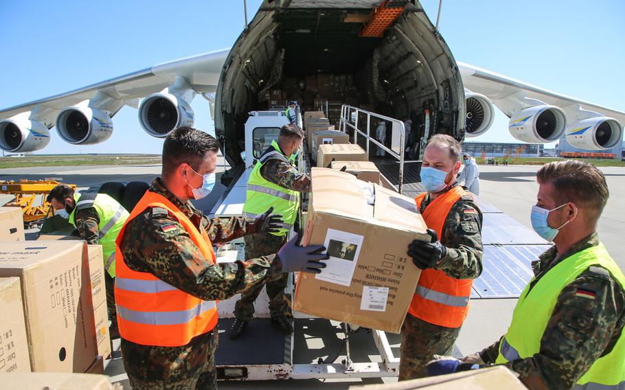 The Antonov-225, the world's largest capacity cargo plane,  is unloaded after arriving at Leipzig/Halle Airport in Germany, April 27, 2020, from China, bringing medical supplies as part of efforts to help curb the spread of the coronavirus.