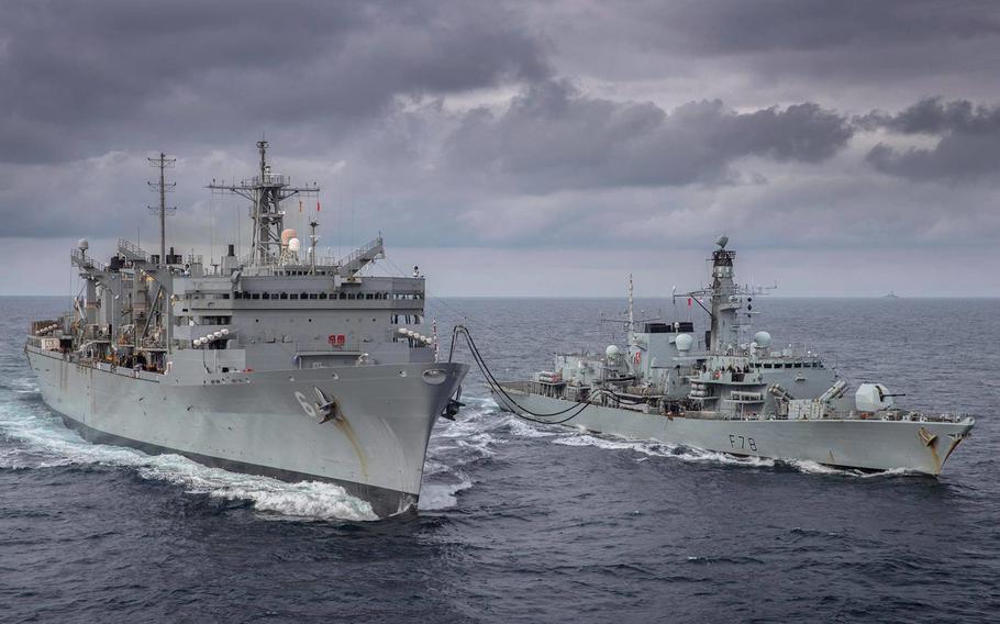 The Royal Navy's HMS Kent, right, takes part in a replenishment-at-sea with fast combat support ship USNS Supply during an  exercise with the U.S. Navy in the Arctic Circle, May 3, 2020.