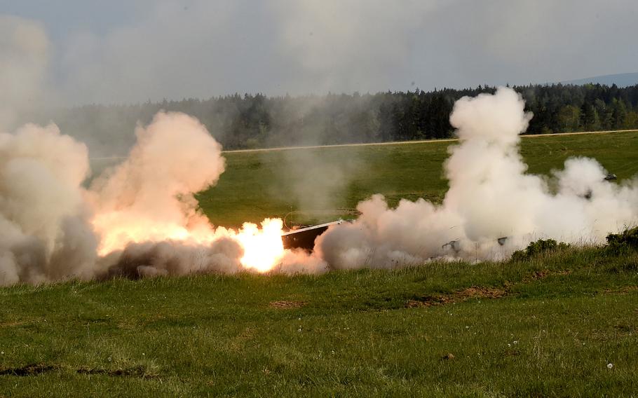 A practice rocket fires as 41st Field Artillery Brigade soldiers train from the Multiple Launch Rocket System during a crew recertification training exercise at Grafenwoehr, Germany, May 8, 2020.