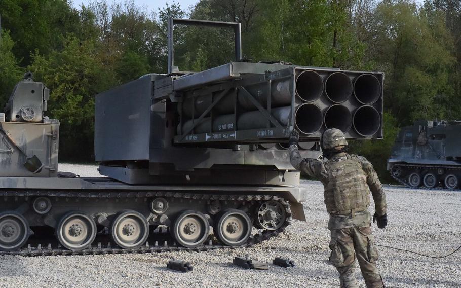 Staff Sgt. Robert Chronister, a section chief with the 41st Field Artillery Brigade, ensures practice rockets are loaded in the Multiple Launch Rocket System before a crew recertification training exercise at Grafenwoehr, Germany, May 8, 2020.