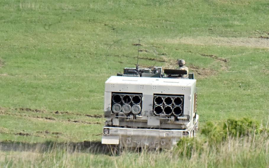 A soldier with the 41st Field Artillery Brigade observes from the Multiple Launch Rocket System at a crew recertification training exercise at Grafenwoehr, Germany, May 8, 2020.