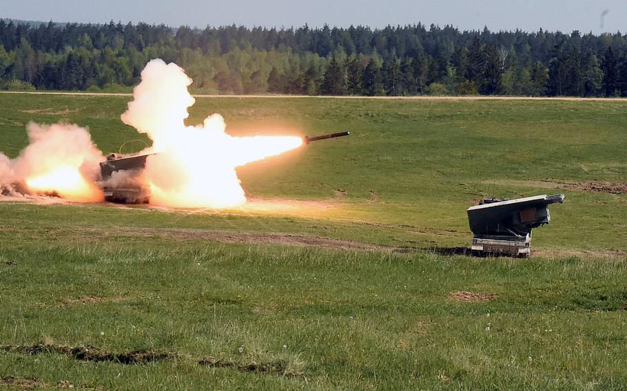 Soldiers with the 41st Field Artillery Brigade launch a practice rocket from inside the Multiple Launch Rocket System during a crew recertification training exercise at Grafenwoehr, Germany, May 8, 2020.