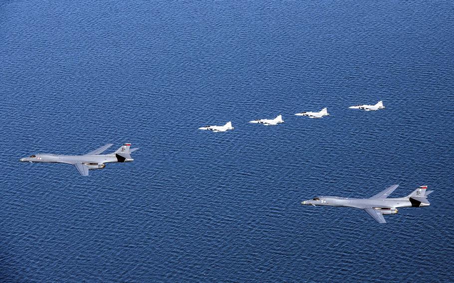 A pair of U.S.-based B-1B bombers fly beside four Swedish Armed Forces Gripen fighter jets for the first time over Sweden during training May 19, 2020.