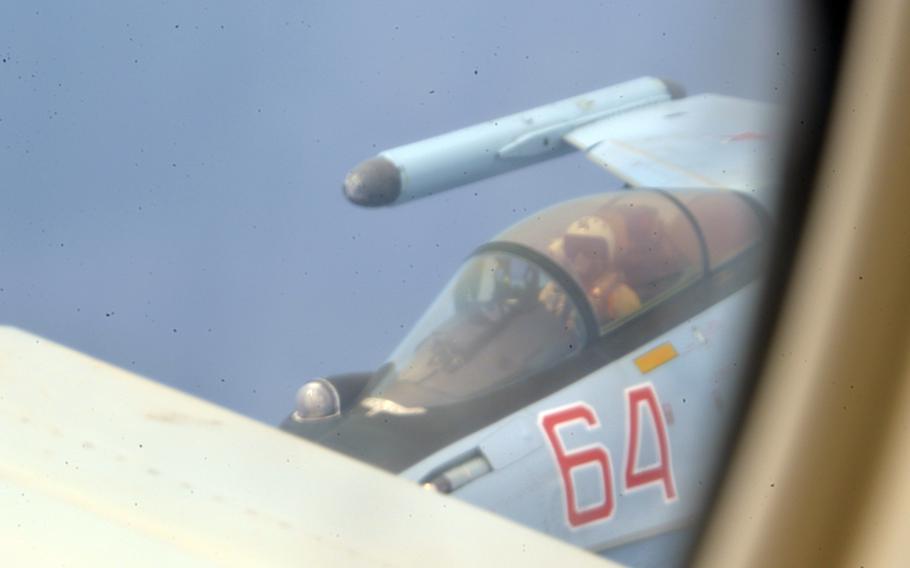 Russian Su-35 aircraft intercept a P-8A Poseidon assigned to the U.S. 6th Fleet over the Mediterranean Sea, Tuesday, May 26, 2020.