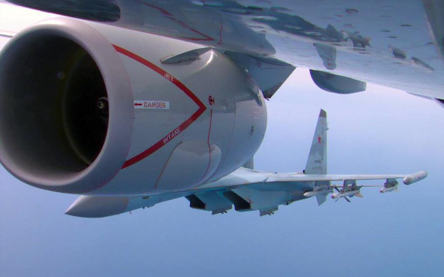 Russian Su-35 aircraft intercept a P-8A Poseidon assigned to the U.S. 6th Fleet over the Mediterranean Sea, Tuesday, May 26, 2020.