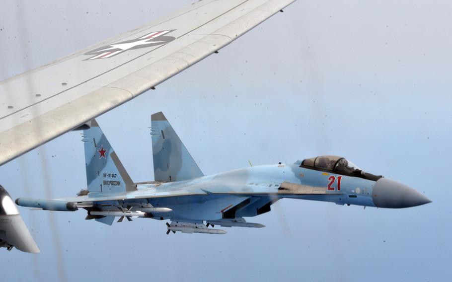 Russian Su-35 aircraft intercept a P-8A Poseidon assigned to the U.S. 6th Fleet over the Mediterranean Sea, Tuesday, May 26, 2020.