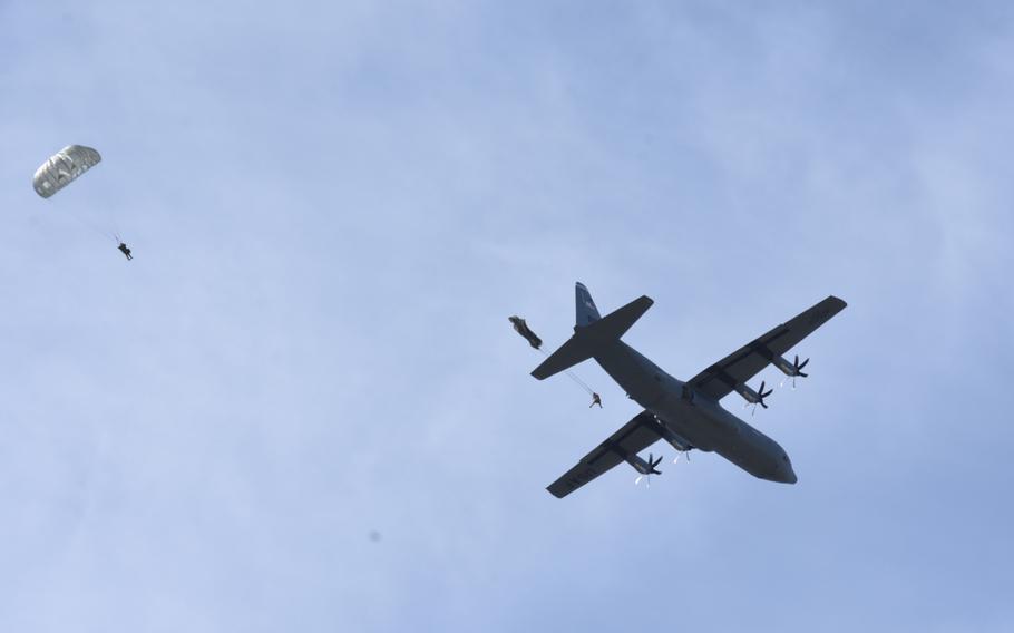 A C-130J Super Hercules assigned to Ramstein Air Base, Germany, drops paratroopers with the 435th Contingency Response Group over Ramstein's drop zone on Tuesday, May 26, 2020, as part of the Agile Wolf exercise. The Ramstein-based jumpers have been using the Ramstein drop zone more due to coronavirus-imposed limitations on travel.