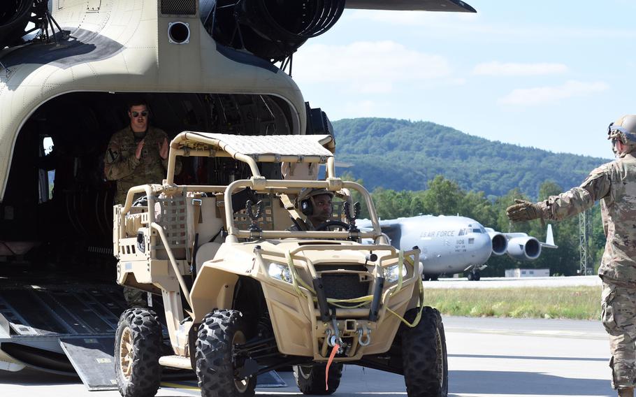 Airmen with the 435th Contingency Response Squadron practice loading a combat all-terrain vehicle into the back of an Army CH-47 Chinook helicopter on Wednesday, May 27, 2020, at Ramstein Air Base, Germany. The training was part of the squadron's Agile Wolf exercise.