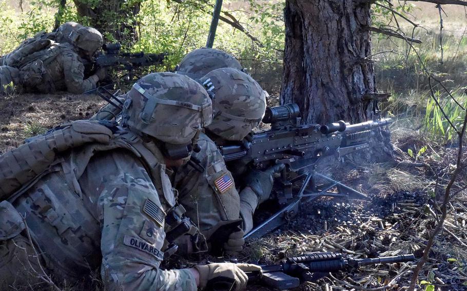 Soldiers with the Enhanced Forward Presence Battle Group fire rounds downrange during their exercise on Bemowo Piskie Training Area in Orzysz, Poland, June 2, 2020. The U.S. and Poland are still negotiating an American troop boost in Poland, officials from both countries have said.