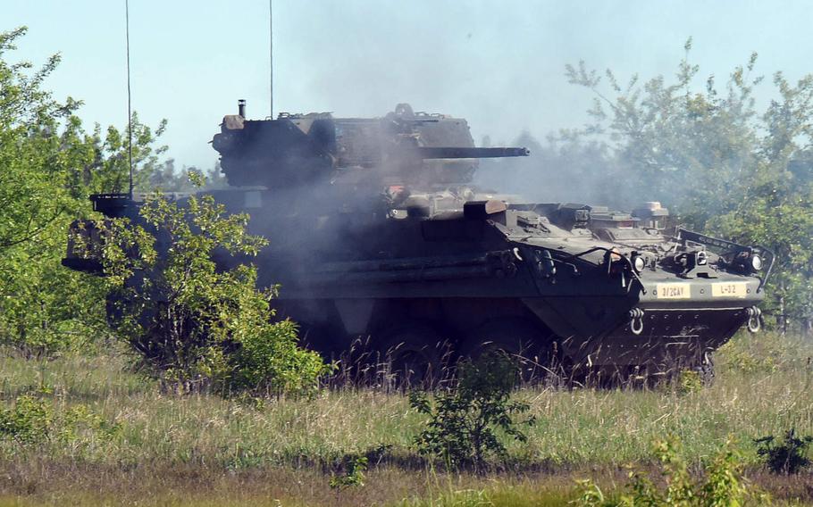 Soldiers with 3rd Squadron, 2nd Cavalry Regiment supporting the Enhanced Forward Presence Battle Group fire in a Stryker armored vehicle during an exericse on Bemowo Piskie Training Area in Orzysz, Poland on June 2, 2020. The U.S. and Poland are still negotiating an American troop boost in Poland, officials from both countries have said.