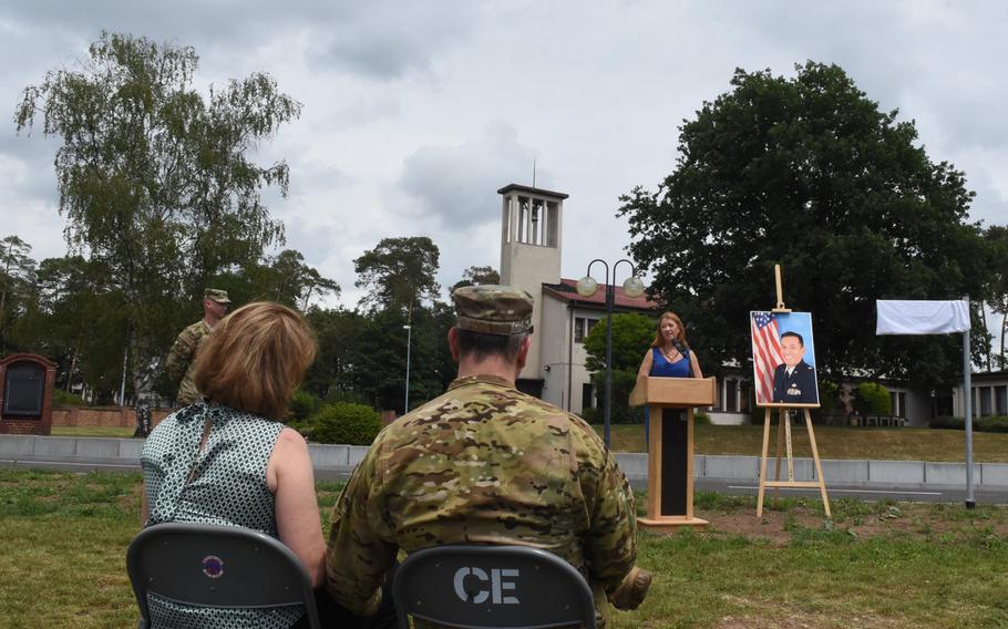 Brig. Gen. Mark August, the 86th Airlift Wing commander, listens to remarks by Caryn Rodriguez during a road dedication ceremony on Tuesday, June 16, 2020, at Ramstein Air Base, Germany. Rodriguez Road is named after Rodriguez's late husband, Air Force Maj. Rodolfo Rodriguez.
