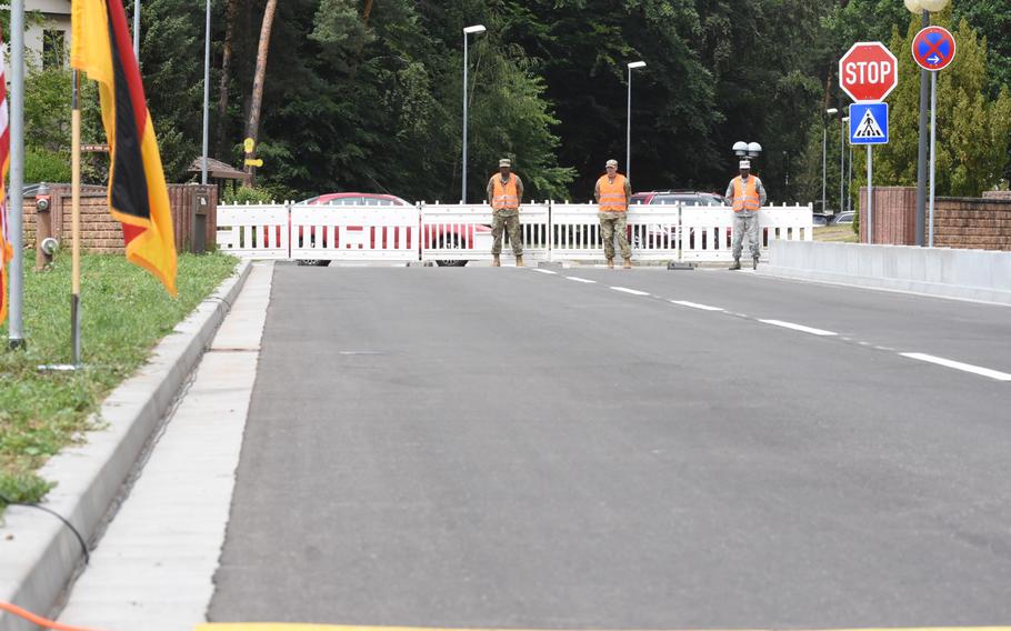 Airmen stand along barriers temporarily blocking the entrance to Rodriguez Road during a dedication ceremony on Tuesday, June 16, 2020. The road, now open, was named after Air Force Maj. Rodolfo Rodriguez, a civil engineer from Ramstein who was killed in the terrorist bombing of the Marriott Hotel in Islamabad, Pakistan, in 2008.