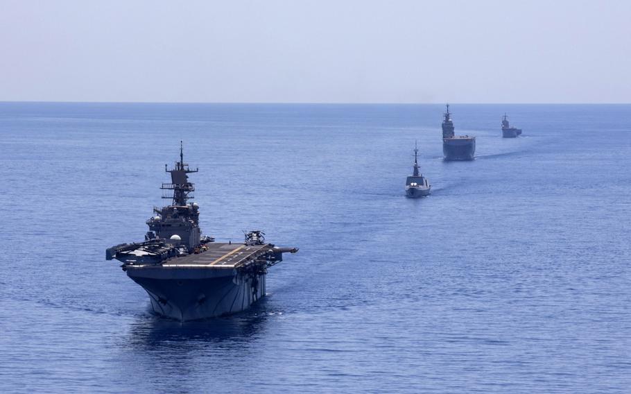 From left, the amphibious assault ship USS Bataan, the French frigate FS Guepratte, the French amphibious assault ship FS Mistral and the Italian amphibious transport dock ship ITS San Giorgio sail in formation as part of a maritime training exercise, June 24, 2020.
