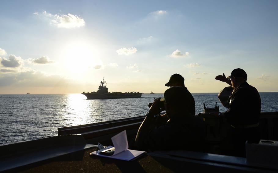 Sailors aboard USS Ross watch as the ship takes part in an exercise with the French Charles de Gaulle carrier strike group in the eastern Mediterranean in 2016. A buildup by Russia is turning the eastern Mediterranean Sea into one of the world's most militarized zones, Adm. James Foggo, head of U.S. Naval Forces Europe and Africa, says.