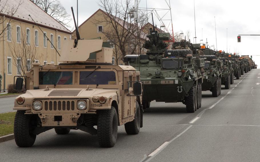 The 2nd Cavalry Regiment rolls through Rose Barracks in Vilseck, Germany, after completing the Dragoon Ride, a 13-day long convoy that stretched across Eastern Europe, April 1, 2015. It is the only brigade-sized ground unit left in Germany and potentially could be part of President Donald Trump's plan to cut 9,500 troops in the country.