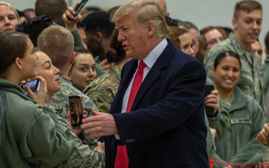 President Donald Trump talks to service members at Ramstein Air Base, Germany, in December 2018. Trump plans to cut 9,500 troops in Germany, but analysts doubt that the largest American base in Europe is on the chopping block.