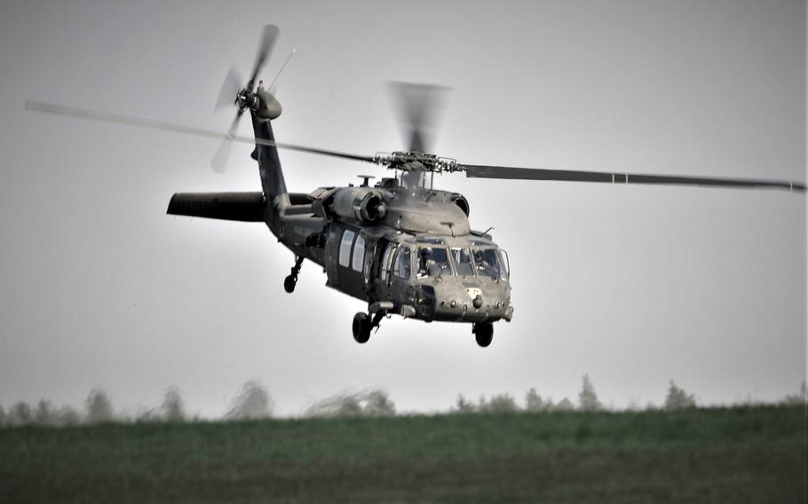 A U.S. Army UH-60 Black Hawk helicopter from the 1st Air Cavalry Brigade from Fort Hood Texas conducts a training flight in 2018 at Katterbach Army Airfield, Germany. The U.S. plans to sell Black Hawks to Lithuania, to bolster NATO capabilities in one of its most exposed regions.