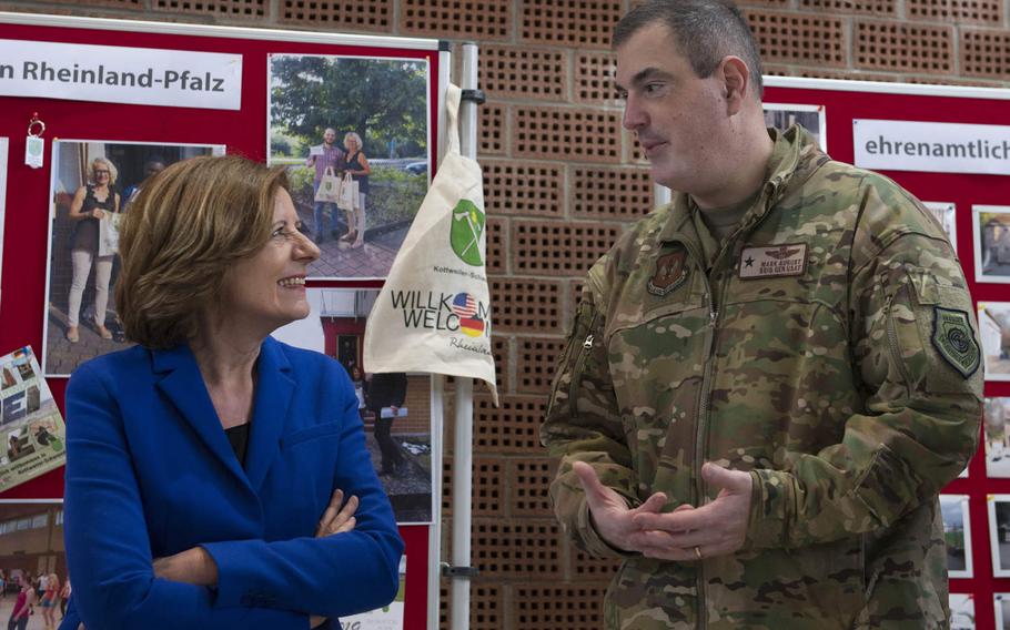 Rheinland-Pfalz Minister President Malu Dreyer speaks with 86th Airlift Wing commander Brig. Gen. Mark August in Kottweiler-Schwanden, Germany, in February 2020. Dreyer is one of four German state heads that sent a letter to U.S. lawmakers, urging them to oppose troop cuts in the country.