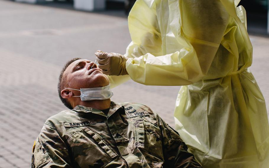 U.S. Army paratroopers assigned to the 173rd Airborne Brigade are tested for the coronavirus on Caserma Del Din, Italy, prior to departing for a training rotation in Germany, July 13, 2020.