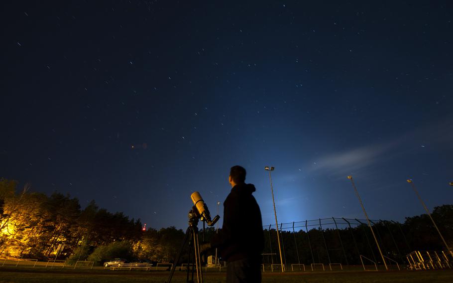 Airman 1st Class Daniel Sanchez, 86th Airlift Wing Public Affairs broadcast journalist, observes the night sky on Kapaun Air Station, Germany, May 16, 2020. Sanchez, who has a passion for space exploration, coined the motto "Semper Supra" for the U.S. Space Force and one day hopes to serve in the military's newest service branch.