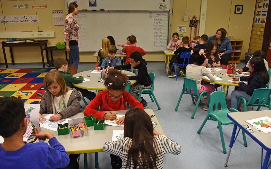 Samantha Sanchez observes second graders in her Spanish  class at Vogelweh Elementary School in Kaiserslautern, Germany in February 2019. Department of Defense Education Activity schools have given parents the option of sending their children back to the classroom or continuing to study remotely during the fall semester.