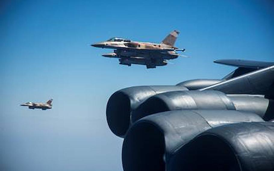 Two Moroccan F-16s fly alongside a U.S. Air Force B-52H Stratofortress from the 5th Bomb Wing out of Minot Air Force Base, N.D., Sept. 7, 2020.