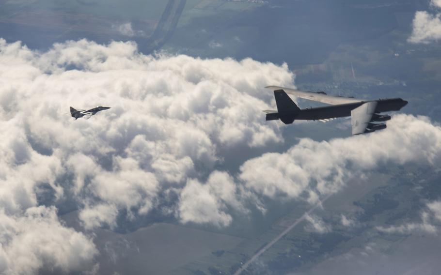 A U.S. B-52H Stratofortress from the 5th Bomb Wing, Minot Air Force Base, N.D.,flies with with a Ukrainian MiG-29 for a Bomber Task Force Europe mission over Ukraine, Sept. 4, 2020.