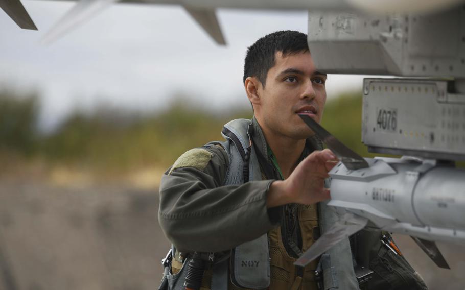 A U.S. Air Force pilot from the 555th Fighter Squadron, Aviano Air Base, Italy, performs a pre-flight check on an F-16 Fighting Falcon at Graf Ignatievo Air Base, Bulgaria, Sept. 21, 2020, during exercise Thracian Viper 20.