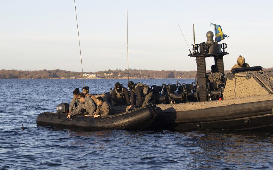 Swedish special forces together with U.S. Navy special warfare combatant-craft crewmen and special reconnaissance unmanned underwater vehicle operators assigned perform launch and recovery training using a Combatant Craft Medium in the Baltic Sea near Karlskrona, Sweden during a bilateral exercise on Nov. 6, 2020.