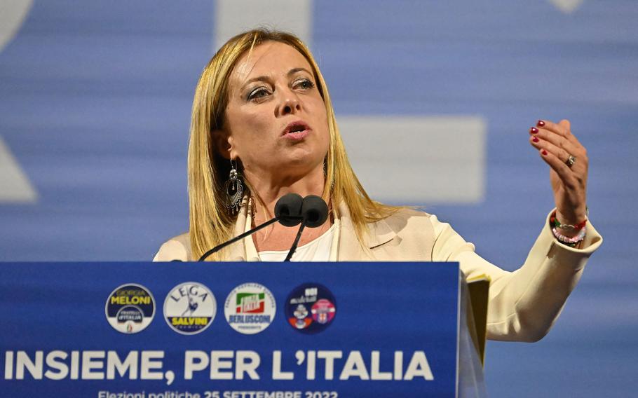Brothers of Italy party leader Giorgia Meloni, now prime minister, gestures as she delivers a speech on stage on Thursday, Sept. 22, 2022, during a joint rally of Italy's right-wing parties Brothers of Italy (Fratelli d'Italia, FdI), the League (Lega) and Forza Italia at Piazza del Popolo in Rome, ahead of the Sept. 25 general election. 