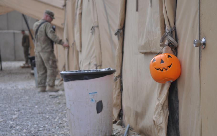 A plastic jack-o’-lantern decorates a tent at COP Gormach, Faryab province in Afghanistan, bringing a touch of Halloween to Afghanistan on Oct. 31, 2011. 

