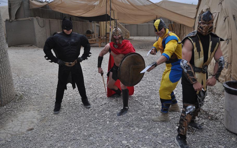 Trick-or-treaters roam COP Gormach in western Faryab province, Afghanistan on Halloween, Oct. 31, 2011. “Yeah, it’s cold,” said shirtless King Leonidas from ‘The 300.’ “And there wasn’t much candy,” said a man dressed as Wolverine.