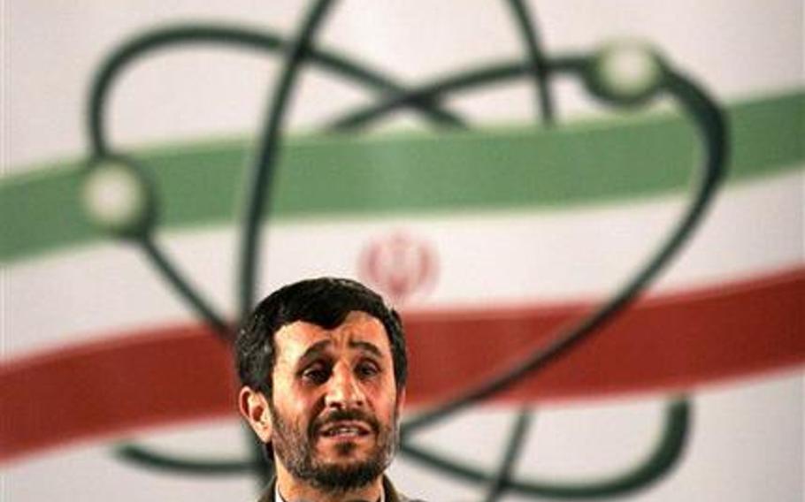 In this April 9, 2007, photo, former Iranian President Mahmoud Ahmadinejad speaks at a ceremony in Iran's nuclear enrichment facility in Natanz, 186 miles south of capital Tehran.  