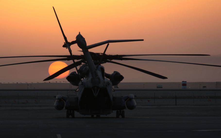 The sun rises over a CH-53E Super Stallion from Marine Heavy Helicopter Squadron 361, 3rd Marine Aircraft Wing (Forward), as it sits on the flightline at Camp Bastion in this file photo from 2010. The Super Stallions are used to transport troops and cargo to International Security Assistance and coalition forces throughout the Regional Command (Southwest) area of operation.