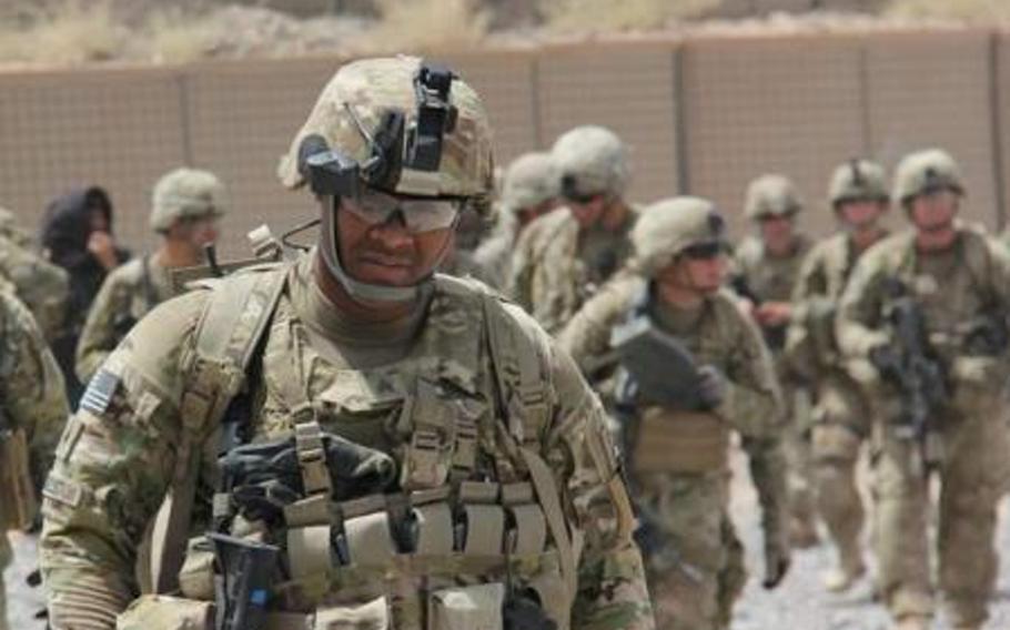 Sgt. Christopher Charleston, then of the 170th Infantry Brigade Combat Team, returns from a mission in Afghanistan in August 2011. At a meeting Oct. 10, 2012, NATO was expected to endorse a plan for the alliance’s post-combat mission.