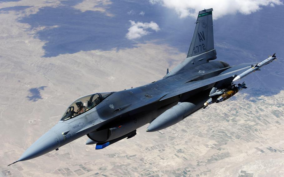 An F-16 Fighting Falcon from Aviano Air Base, Italy, moves away after receiving fuel from a KC-135 Stratotanker over Afghanistan in this March 2011 photo.
