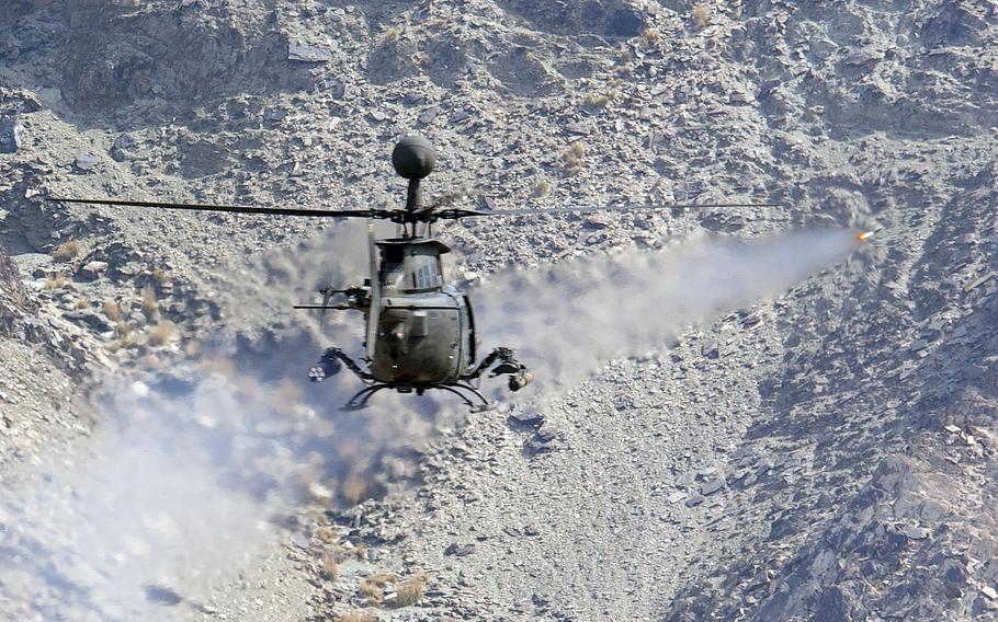 An OH-58D Kiowa Warrior fires a rocket during a test flight in eastern Afghanistan on Mar. 1, 2012. 