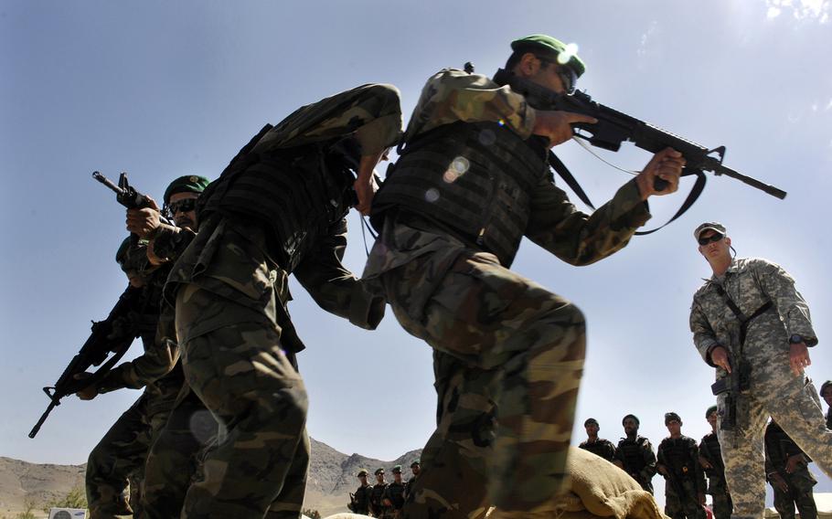 Afghan National Army members receive training at Morehead Commando Training Camp in Kabul, on June 4, 2007.  