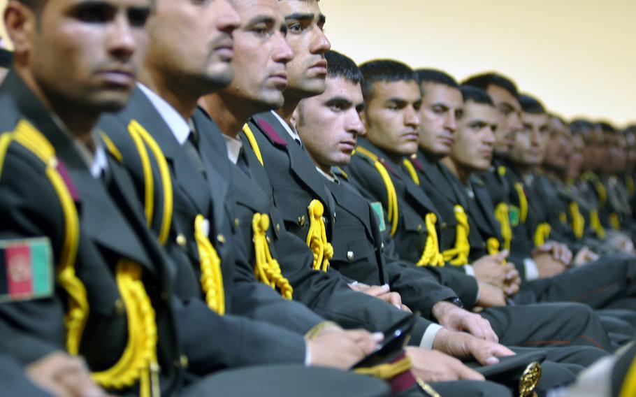 Afghan troops attend a ceremony Tuesday, June 18, 2013, marking the handover of lead security responsibility for Afghanistan to the Afghan National Security Forces.
