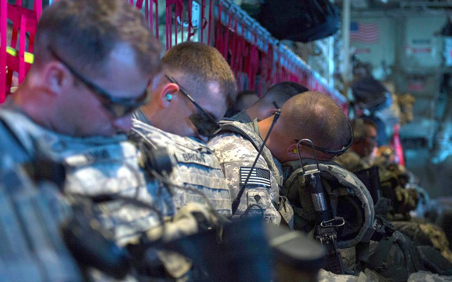 U.S. troops with Combined Joint Task Force-Horn of Africa's East Africa Response Force travel on a C-130 Hercules from Camp Lemonnier, Djibouti, on Dec. 18, 2013. The EARF deployed to South Sudan supporting the ordered departure of the U.S. Embassy.
