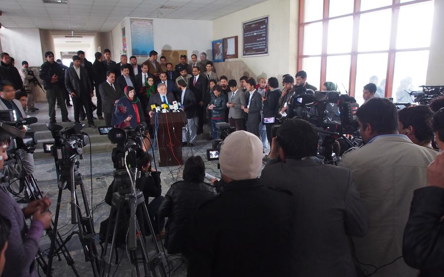 Mohammad Youssuf Nuristani, head of the Afghan government's election organizing body, the Independent Election Commission, gives a news conference after voting in Afghanistan's presidential election on Saturday, April 5, 2014. 