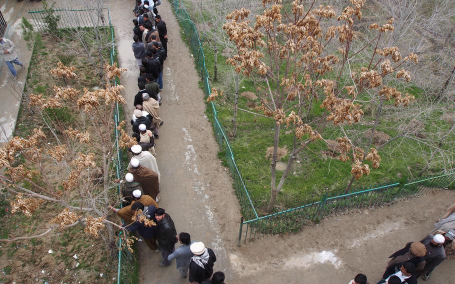 Many polling stations in Kabul saw huge lines on Saturday, April 5, 2014, for Afghanistan's presidential election. A successful election would mark the first democratic transition of power in the country's history.