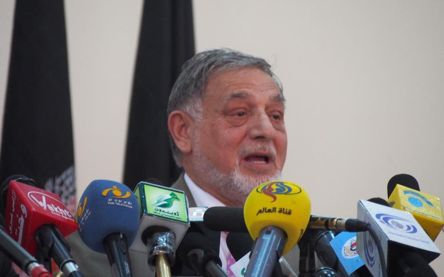 Mohammad Yousuf Nuristani, director of Afghanistan's Independent Election Commission, announces preliminary results of the country's historic presidential election Sunday. The early count has former foreign minister Abdullah Abdullah and former finance minister Ashraf Ghani in a close race. 