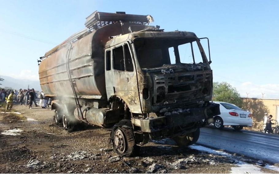 A burned fuel tanker after an attack on a truck convoy bound for a coalition military base in Afghanistan. Afghan trucking officials say attacks have increased in the last year, though Afghan government and coalition military officials dispute this claim.