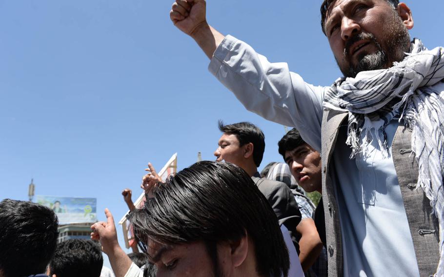 Supporters of Afghan presidential candidate Abdullah Abdullah protest in Kabul what they claim was massive election fraud on Saturday, June 21, 2014.