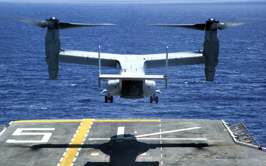 An MV-22 Osprey, assigned to Marine Medium Tiltrotor Squadron (VMM) 161, launches from the flight deck of the amphibious assault ship USS Peleliu while underway during Rim of the Pacific Exercise 2014.